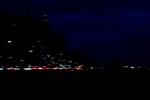 dark night scene with blurry lights